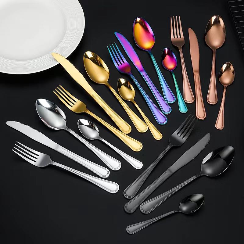 Elegant vintage stainless steel cutlery set with dessert spoon, fork, and knife

