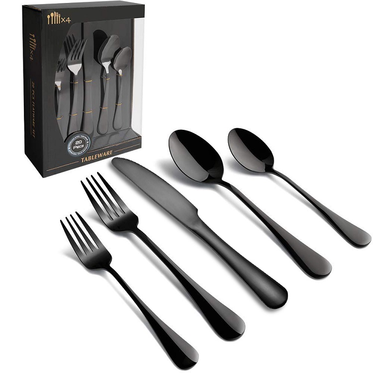 Elegant vintage stainless steel cutlery set with dessert spoon, fork, and knife

