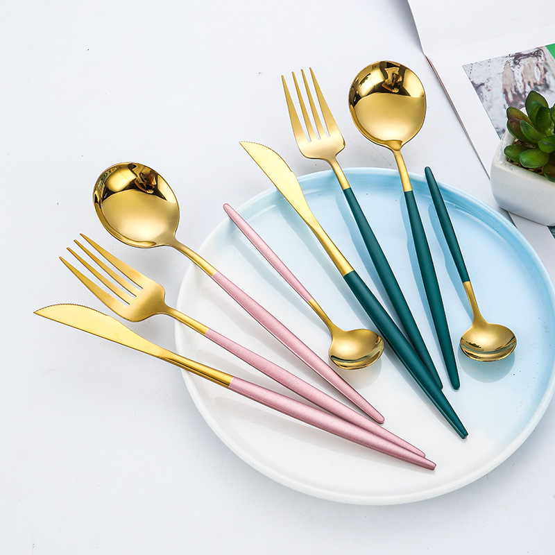 Stainless steel cutlery set with knife, fork, and spoon for restaurant or home use

