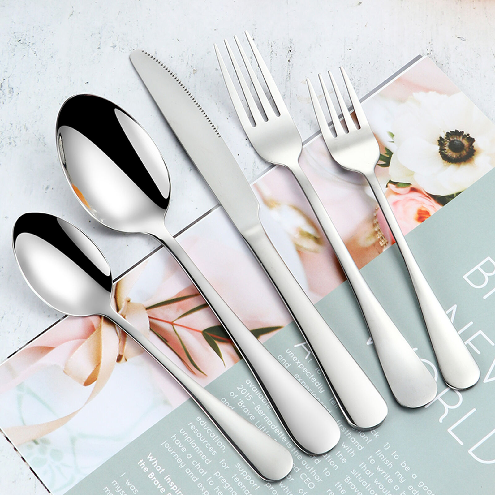Stainless steel cutlery set with knife, fork, and spoon for restaurant or home use

