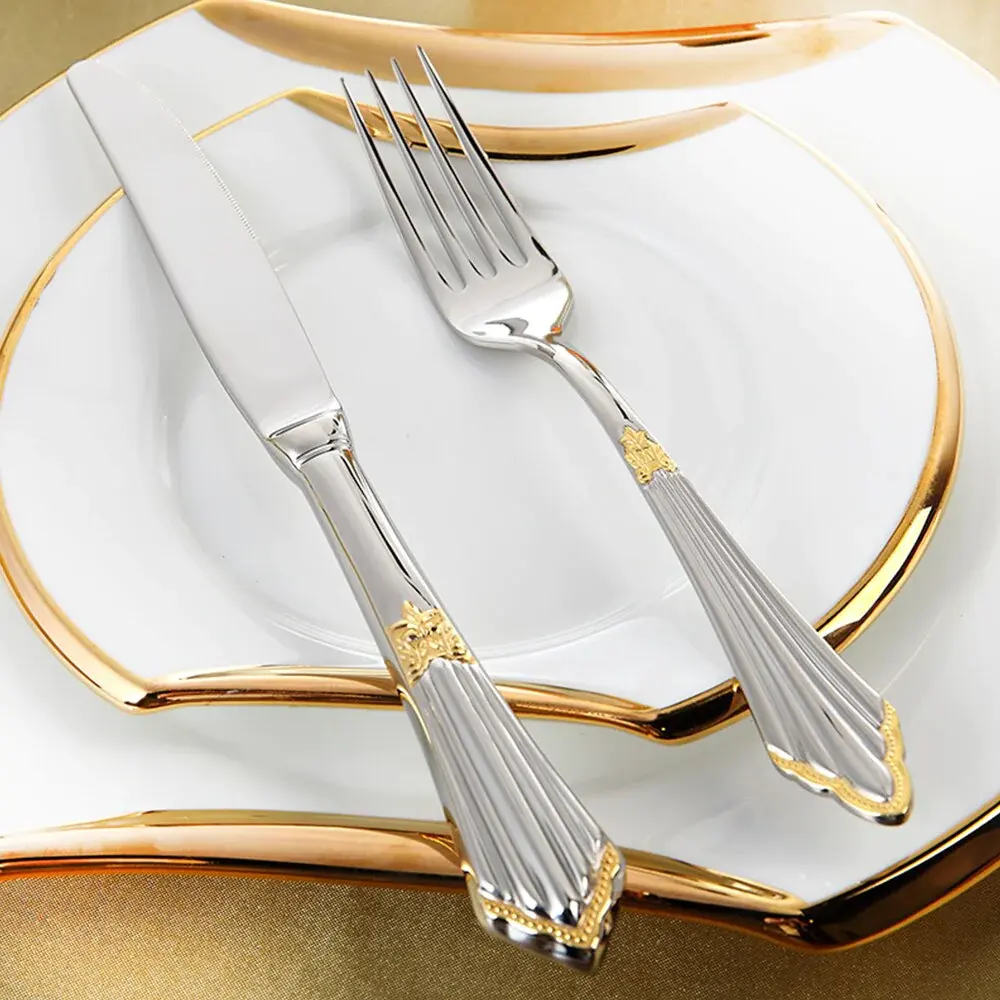 Golden stainless steel cutlery spoon with elegant design for premium dining

