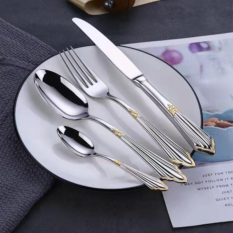 Golden stainless steel cutlery spoon with elegant design for premium dining

