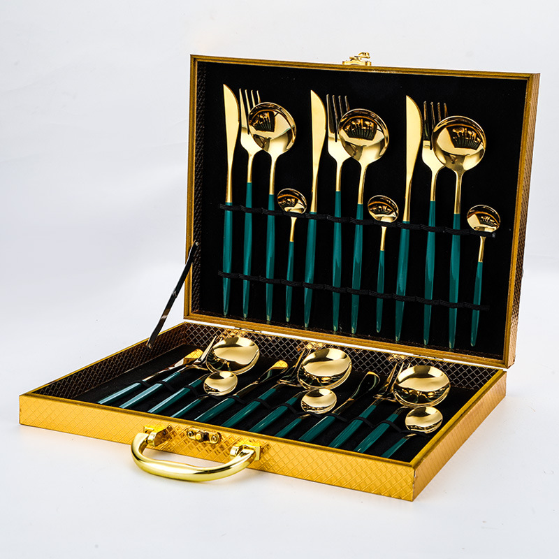 Complete gold flatware set including knife, fork, spoon in luxury stainless steel design

