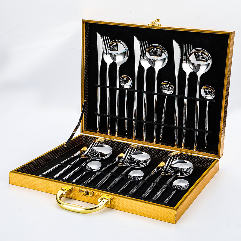 Complete gold flatware set including knife, fork, spoon in luxury stainless steel design

