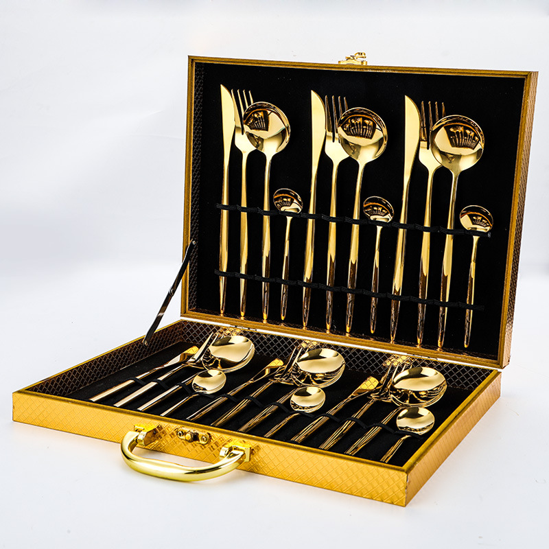 Complete gold flatware set including knife, fork, spoon in luxury stainless steel design

