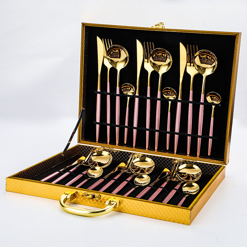 Complete gold flatware set including knife, fork, spoon in luxury stainless steel design

