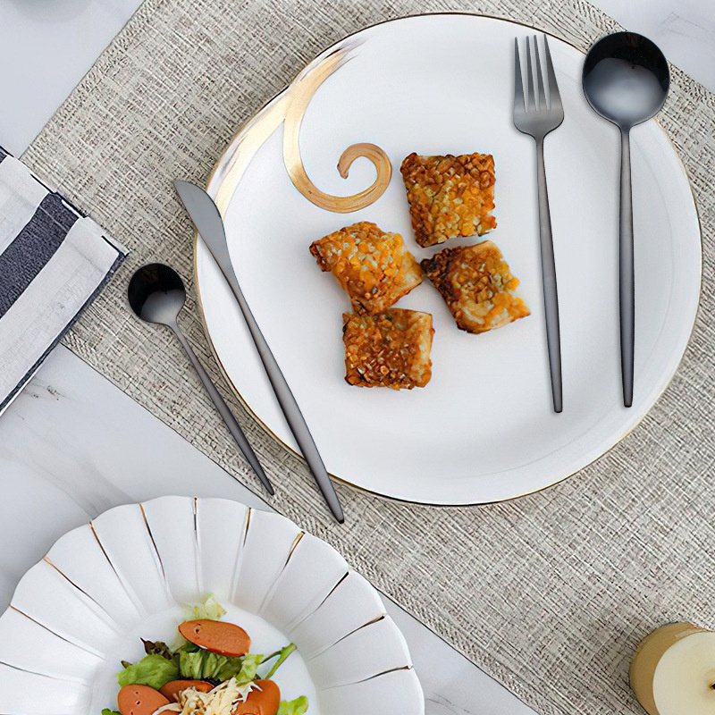 Premium metal kitchen utensil set including ladle, spatula, serving tools in modern design

