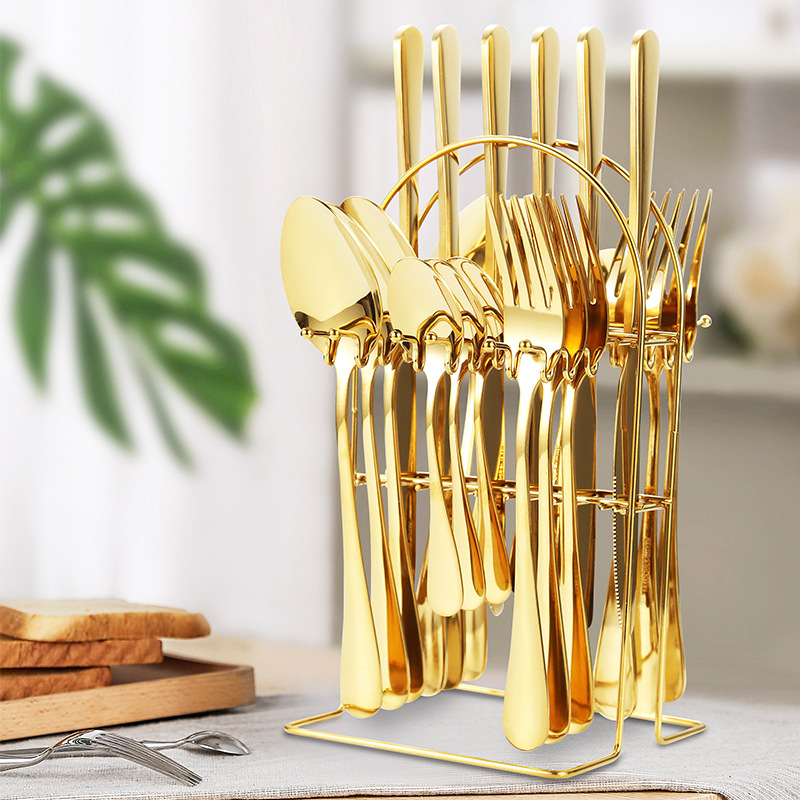 Gold stainless steel spoon and fork cutlery set for luxury restaurant table settings

