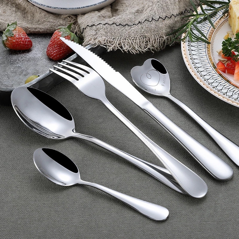 Stainless steel serving cutlery set including service knife, spoon, and fork

