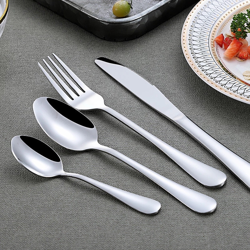 Stainless steel serving cutlery set including service knife, spoon, and fork

