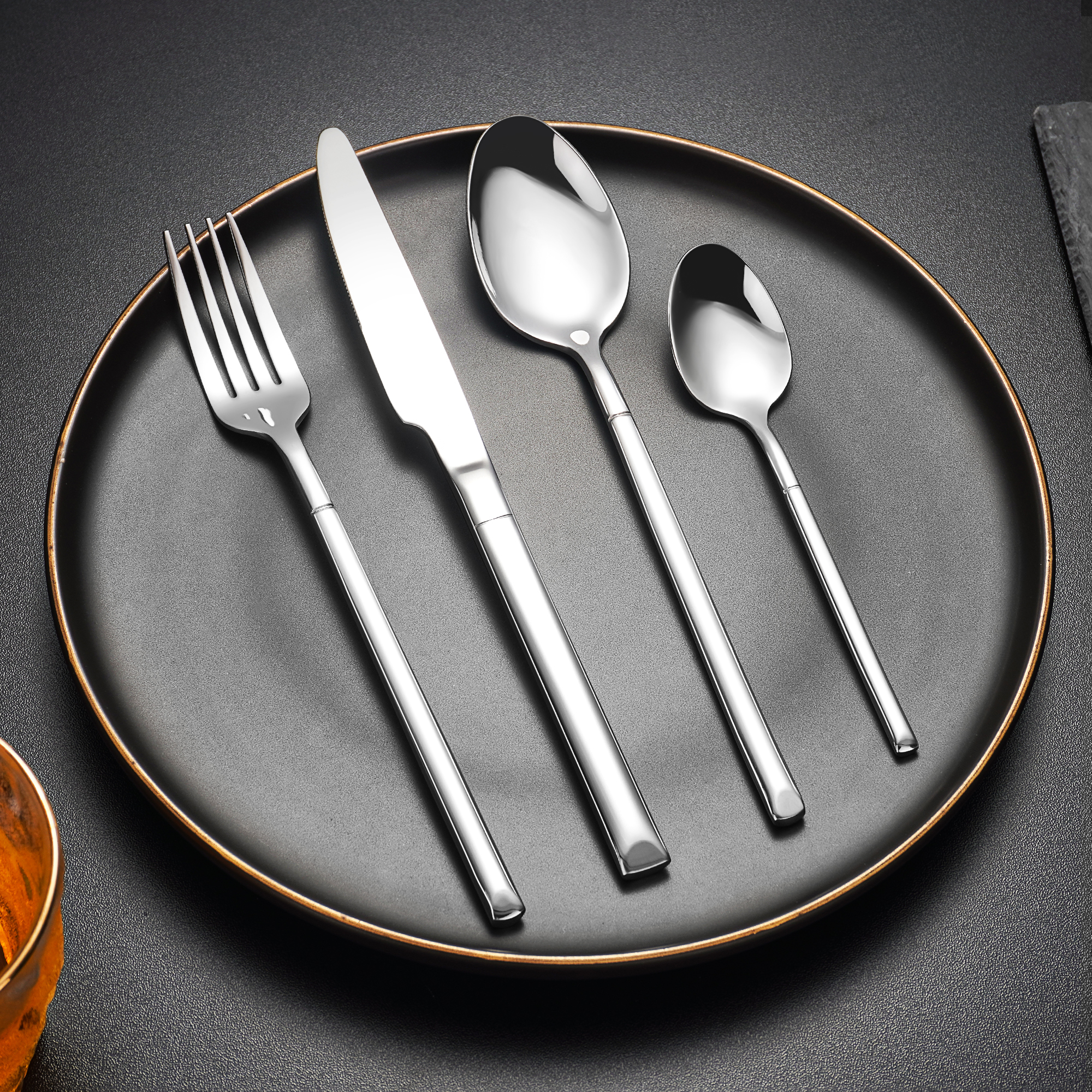 Food-grade stainless steel cutlery set with spoon, fork, and knife for safe dining

