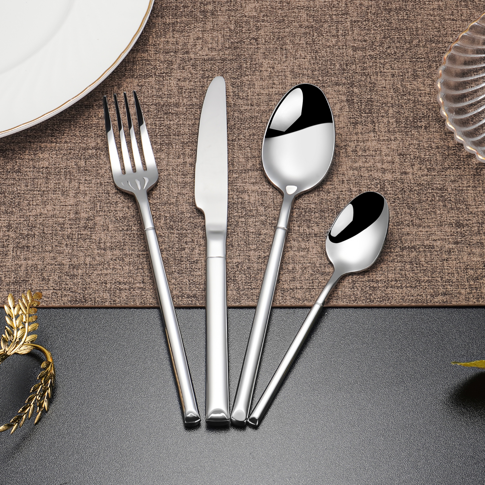 Food-grade stainless steel cutlery set with spoon, fork, and knife for safe dining

