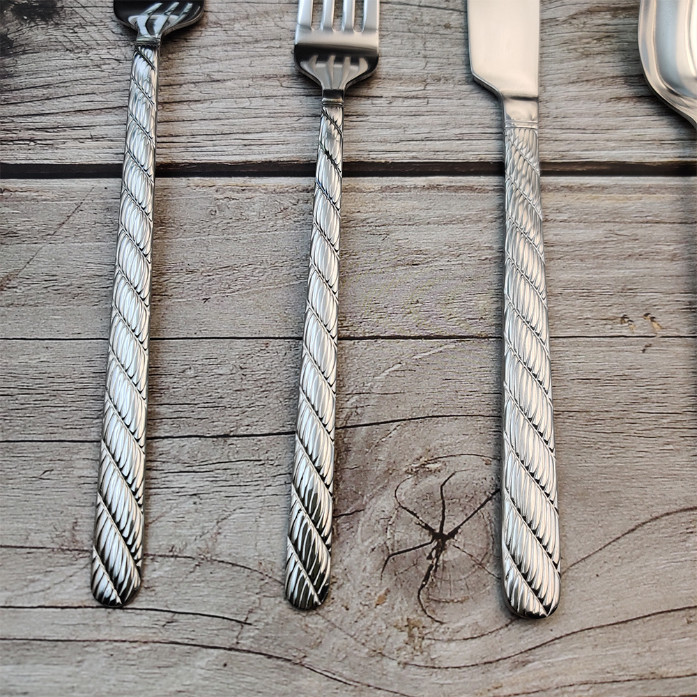 Elegant knife fork spoon cutlery set for weddings, banquets, and party table settings


