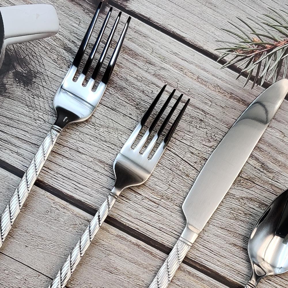 Elegant knife fork spoon cutlery set for weddings, banquets, and party table settings

