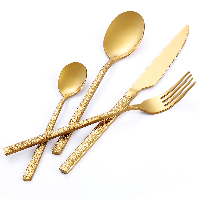 Colorful stainless steel cutlery set with padded handles and modern design

