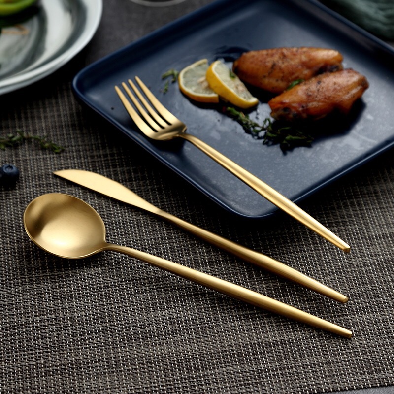 Stainless steel kitchen cutlery set including knife, fork, and spoon