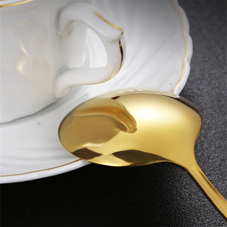Stainless steel cutlery set including knife, fork, and spoon

