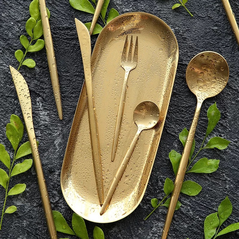 Reusable gold stainless steel cutlery set with elegant modern design


