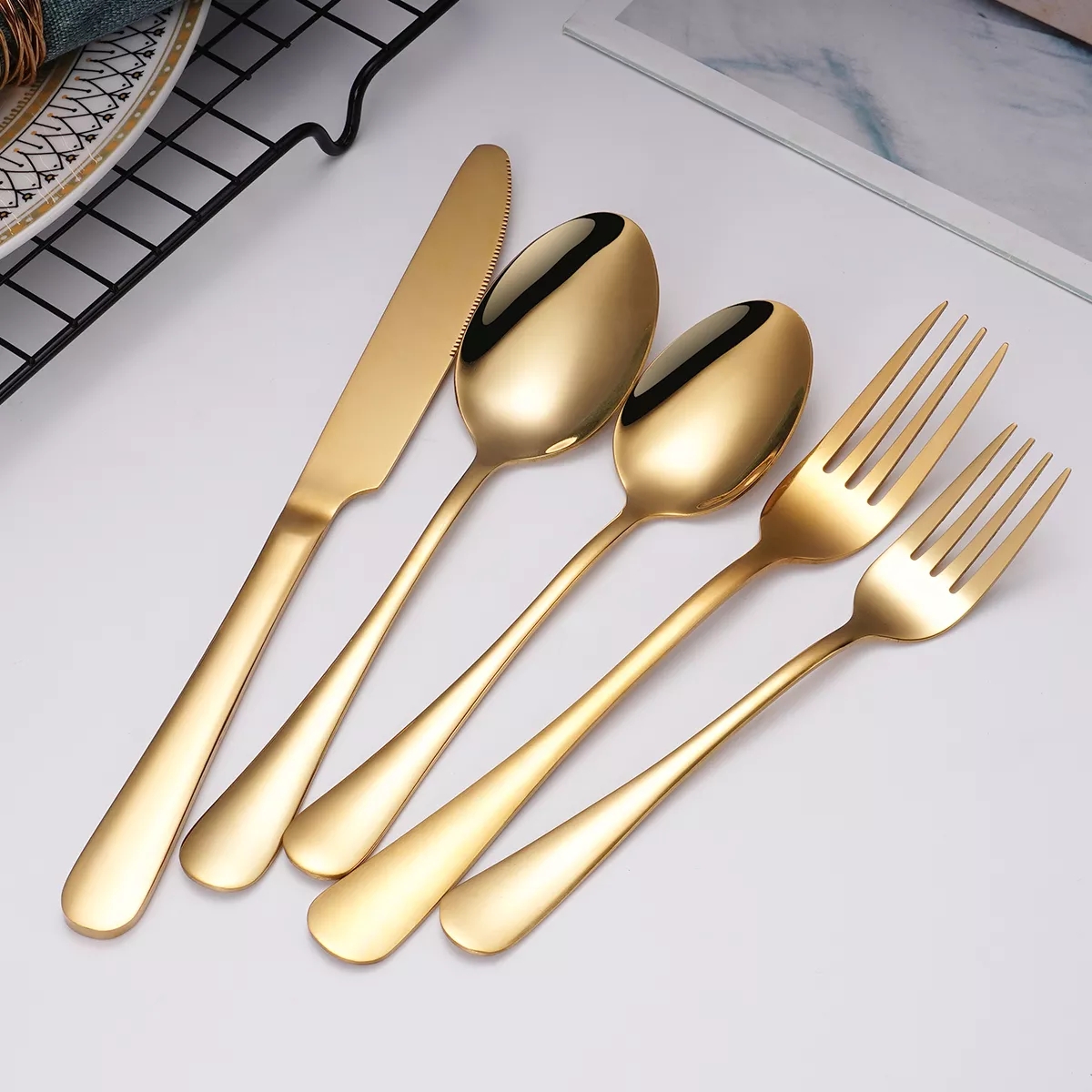 Modern matte gold stainless steel dinner cutlery set with elegant finish