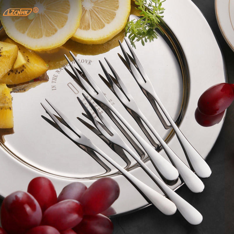 Wedding cutlery set with knife, fork, and spoon in polished stainless steel finish

