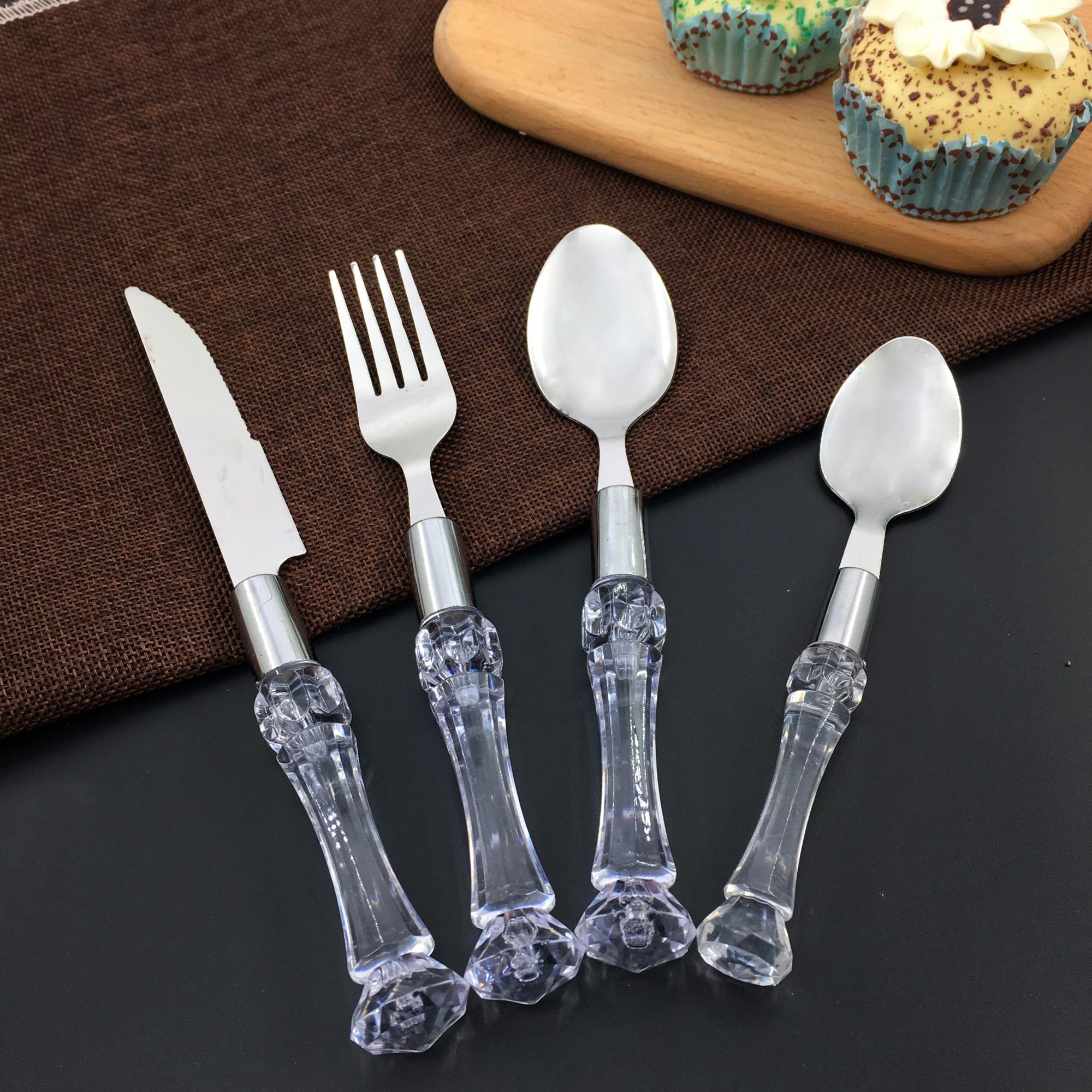 Stainless steel fork and spoon set with modern ergonomic design

