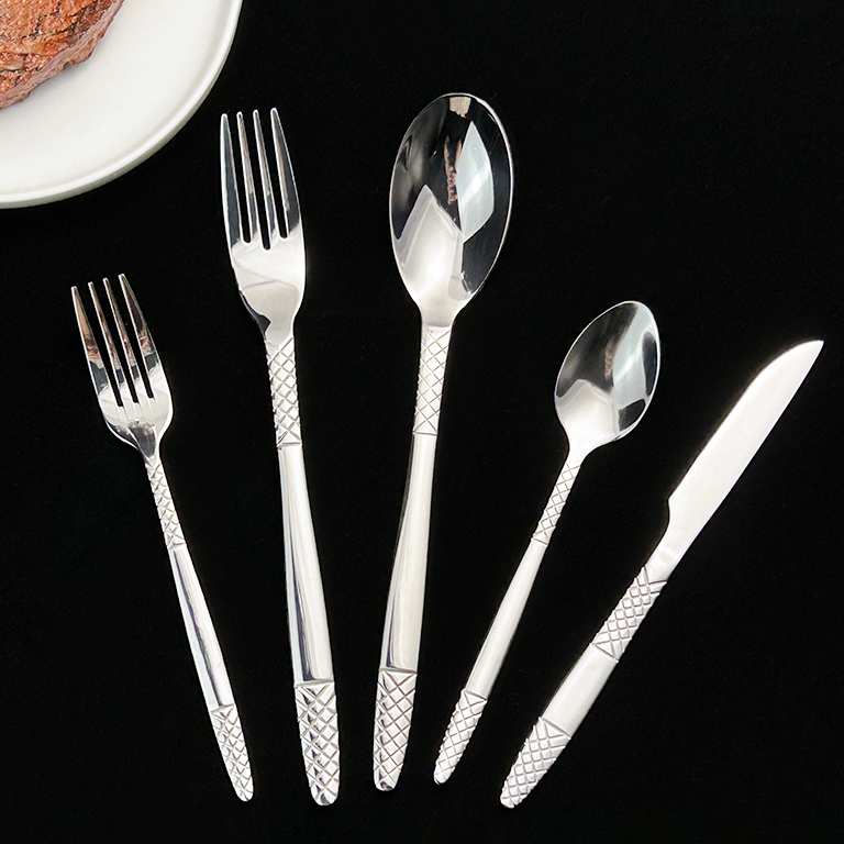 Silver cutlery set with knife, fork, and spoon for elegant dining and banquet use

