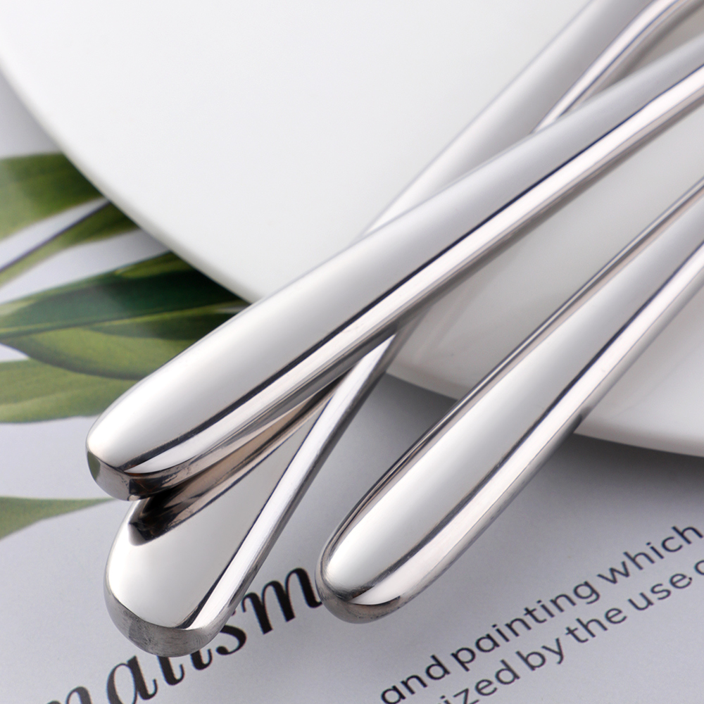 Silver cutlery set with knife, fork, and spoon for elegant dining and banquet use

