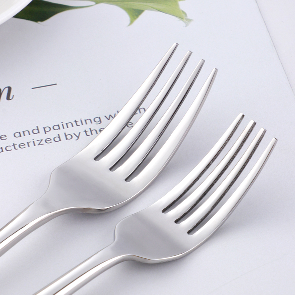 Silver cutlery set with knife, fork, and spoon for elegant dining and banquet use

