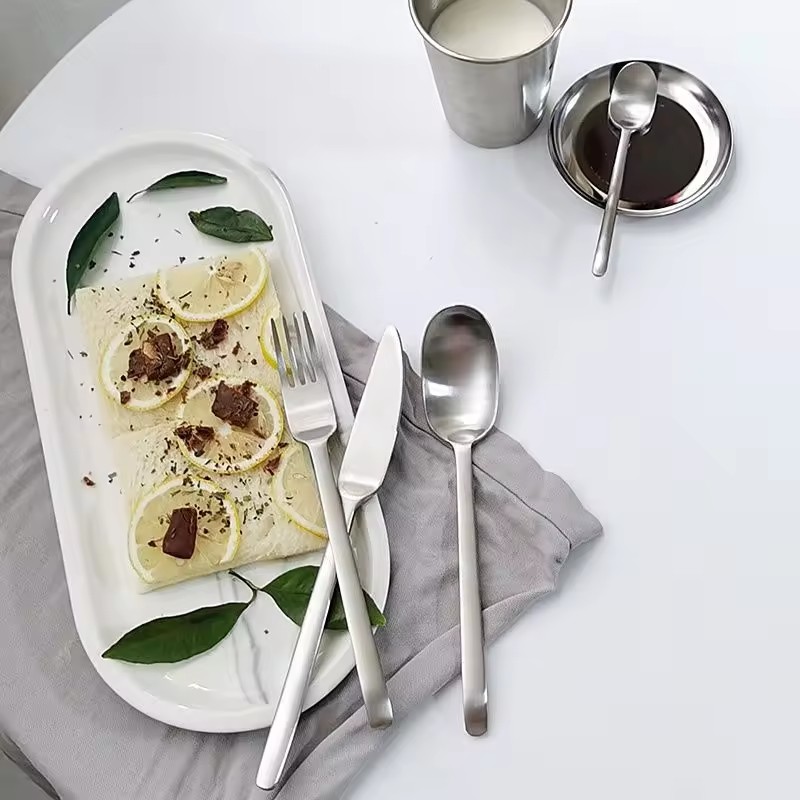 High-end stainless steel flatware set with polished finish for fine dining

