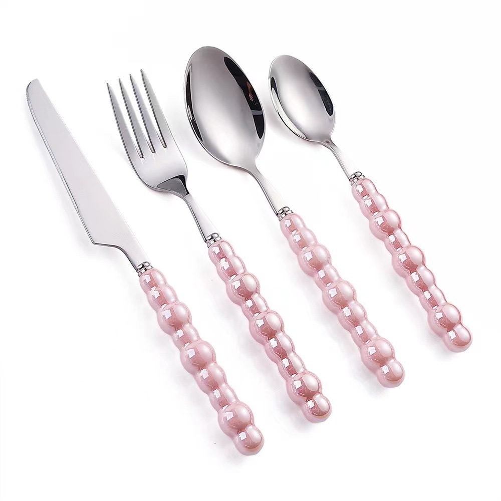 Colorful ceramic handle cutlery set with fork, knife, and spoon

