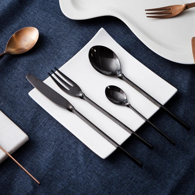 Luxury stainless steel cutlery set with polished finish and elegant design

