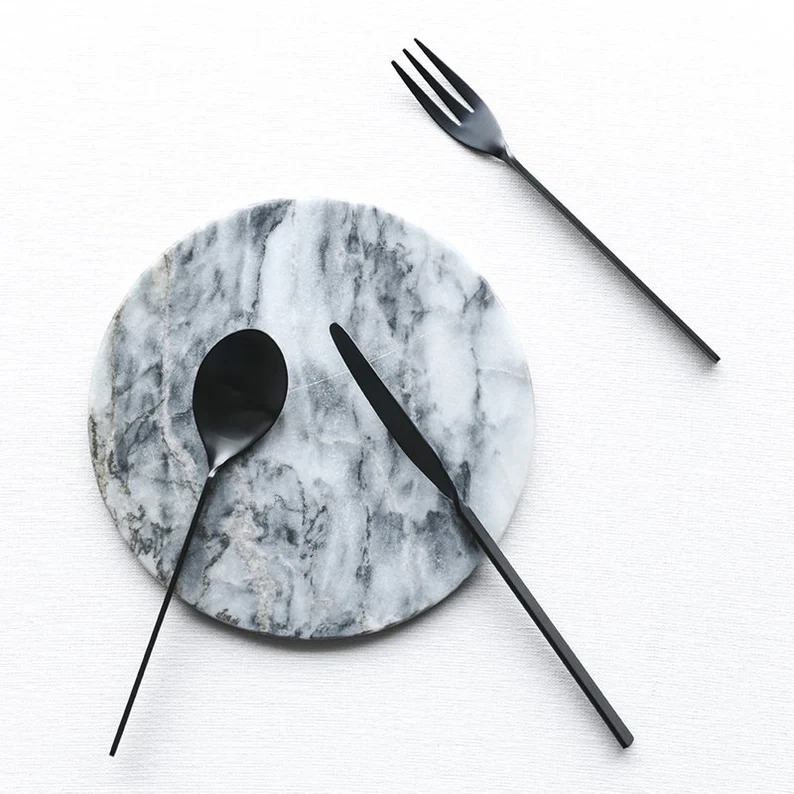 Luxury stainless steel cutlery set with polished finish and elegant design

