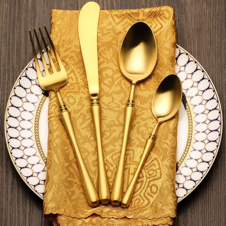 Luxury stainless steel cutlery set with polished finish and elegant design

