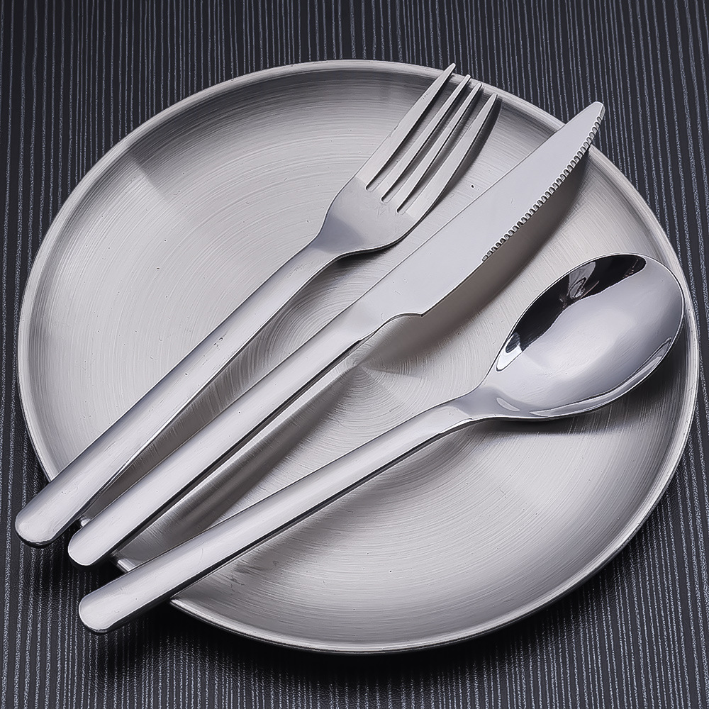 Reusable cutlery set with fork, knife, spoon and travel case for eco-conscious dining

