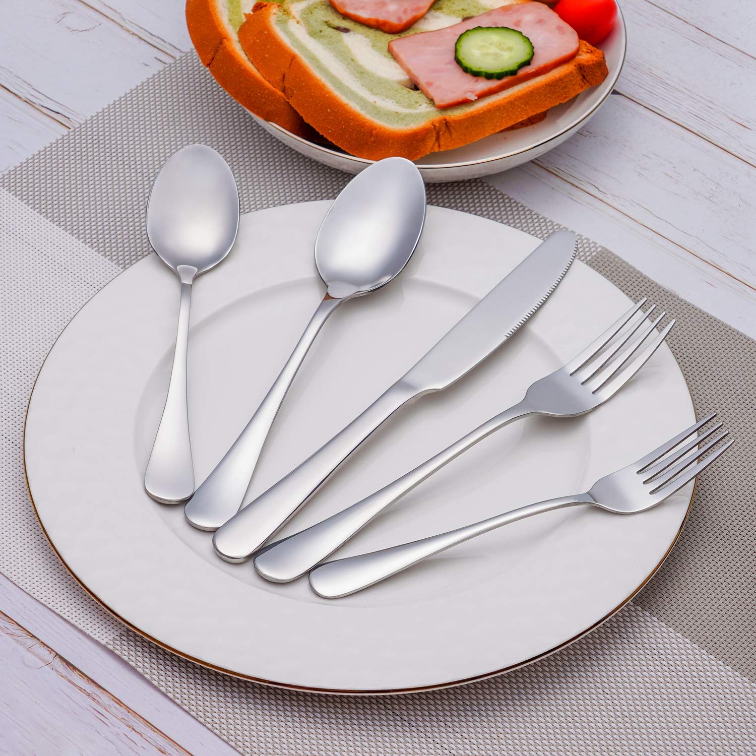 Premium silver cutlery set with knife, fork, and spoon for luxury dining

