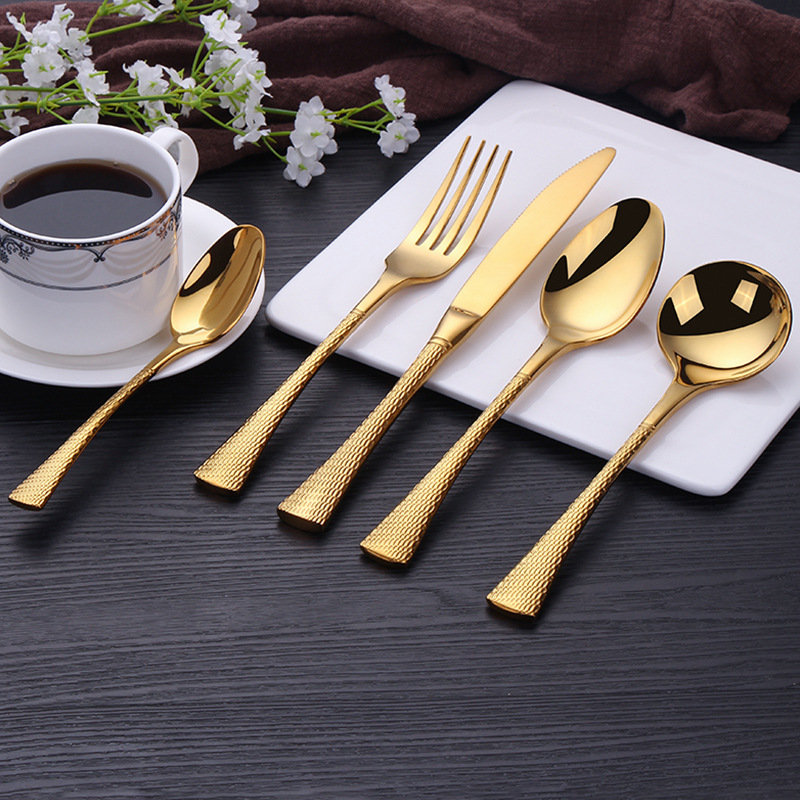 Elegant stainless steel cutlery set for wedding banquets with knife, fork, and spoon

