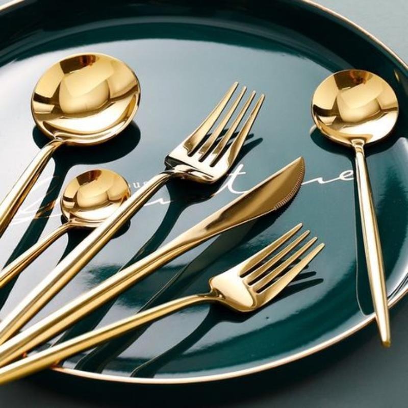 Elegant stainless steel cutlery set for wedding banquets with knife, fork, and spoon

