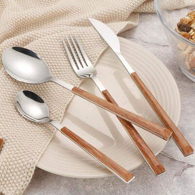 Elegant stainless steel cutlery set for wedding banquets with knife, fork, and spoon

