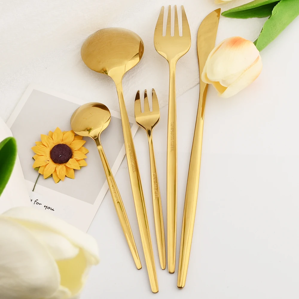 Stainless steel kitchen cutlery set including fork, spoon, and knife

